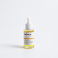 Skincare serum bottle with dropper labeled 'SJÖ+CO.' on a white background